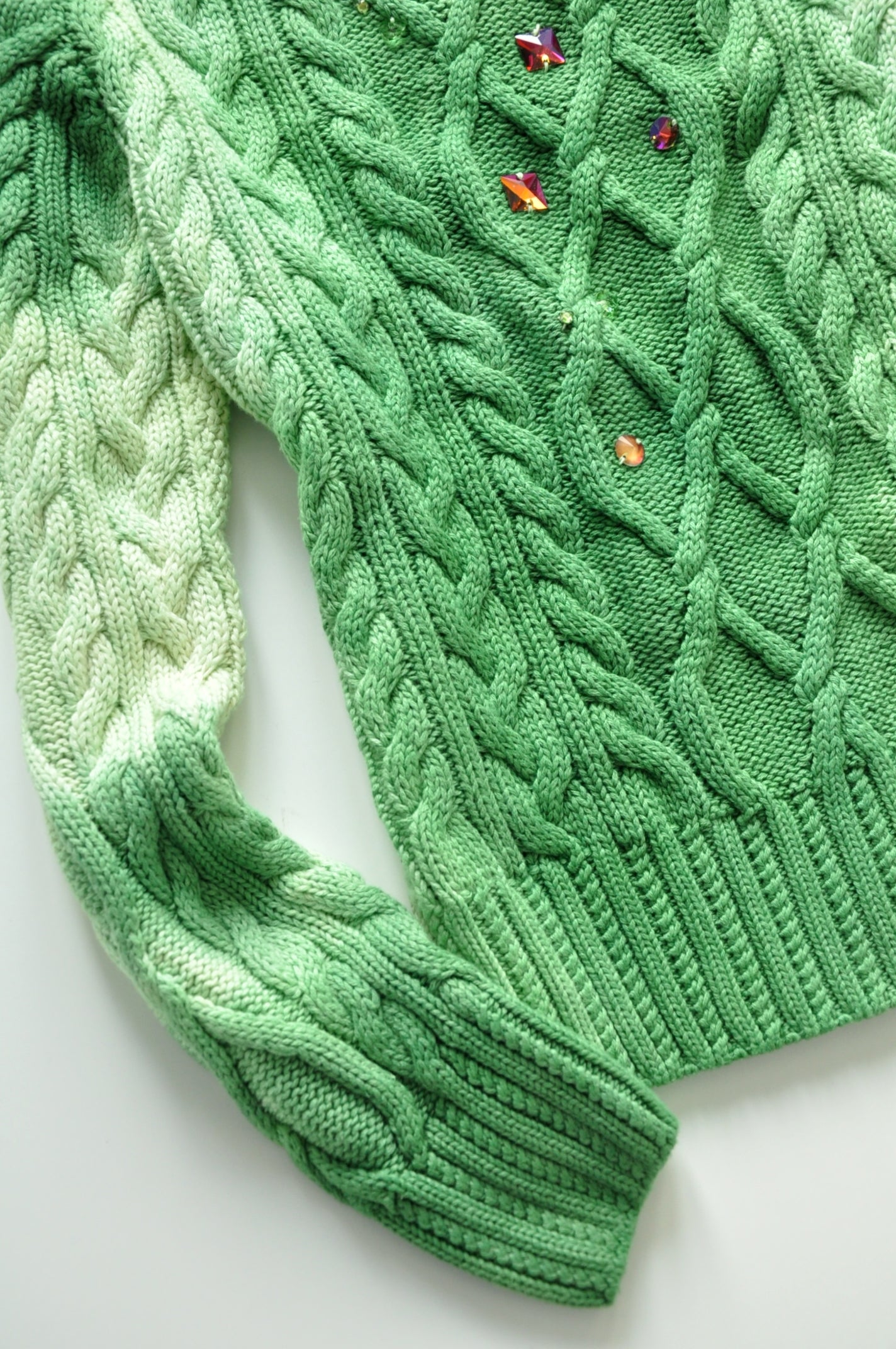 Green cable knit jumper