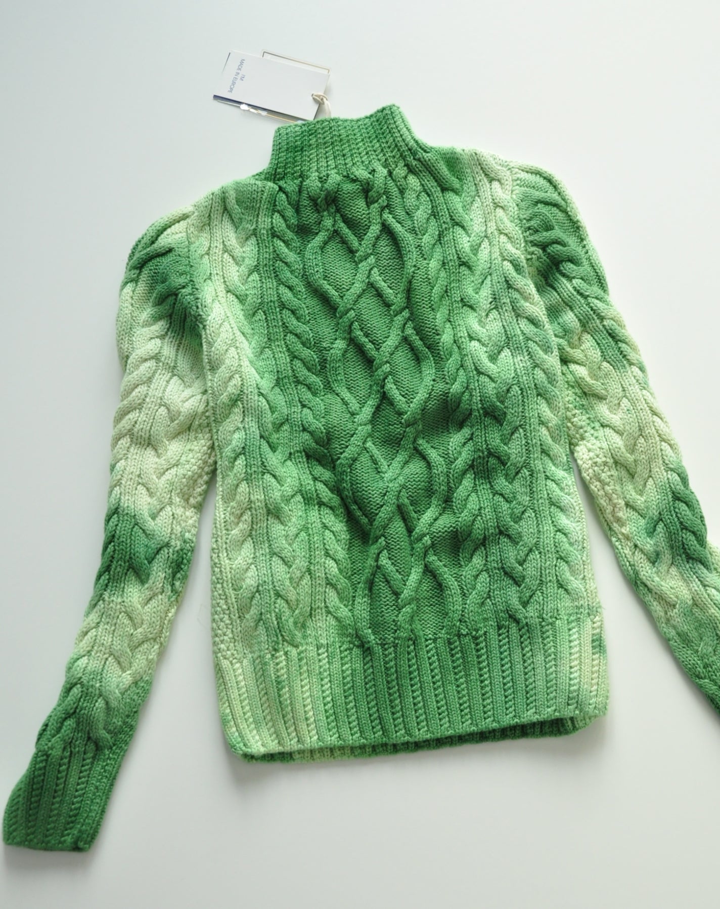 Green cable knit jumper