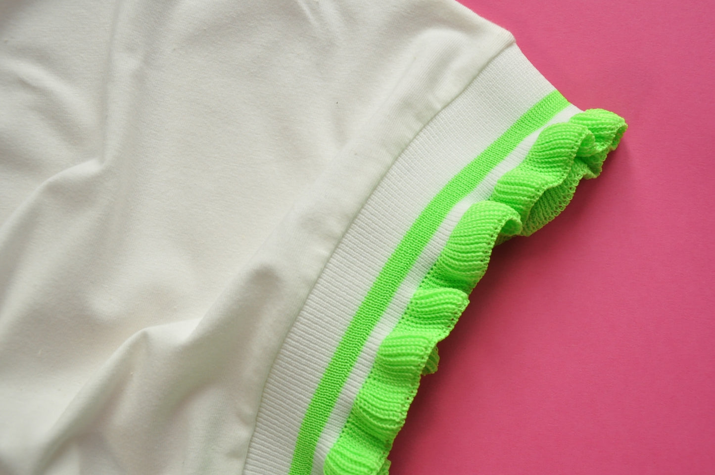 Cream soft cotton tee with extreme knit frill neon green sleeves