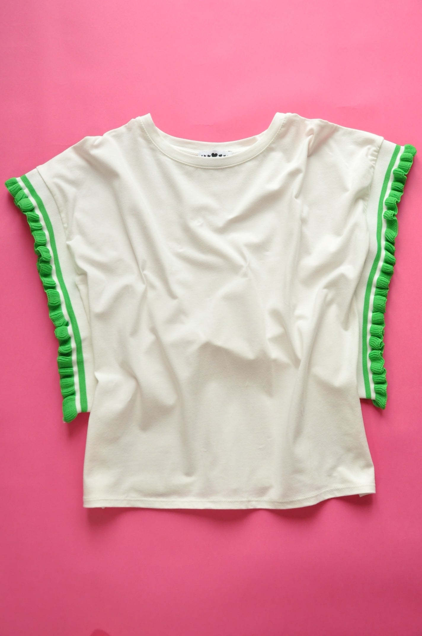 Cream soft cotton tee with extreme knit frill green sleeves