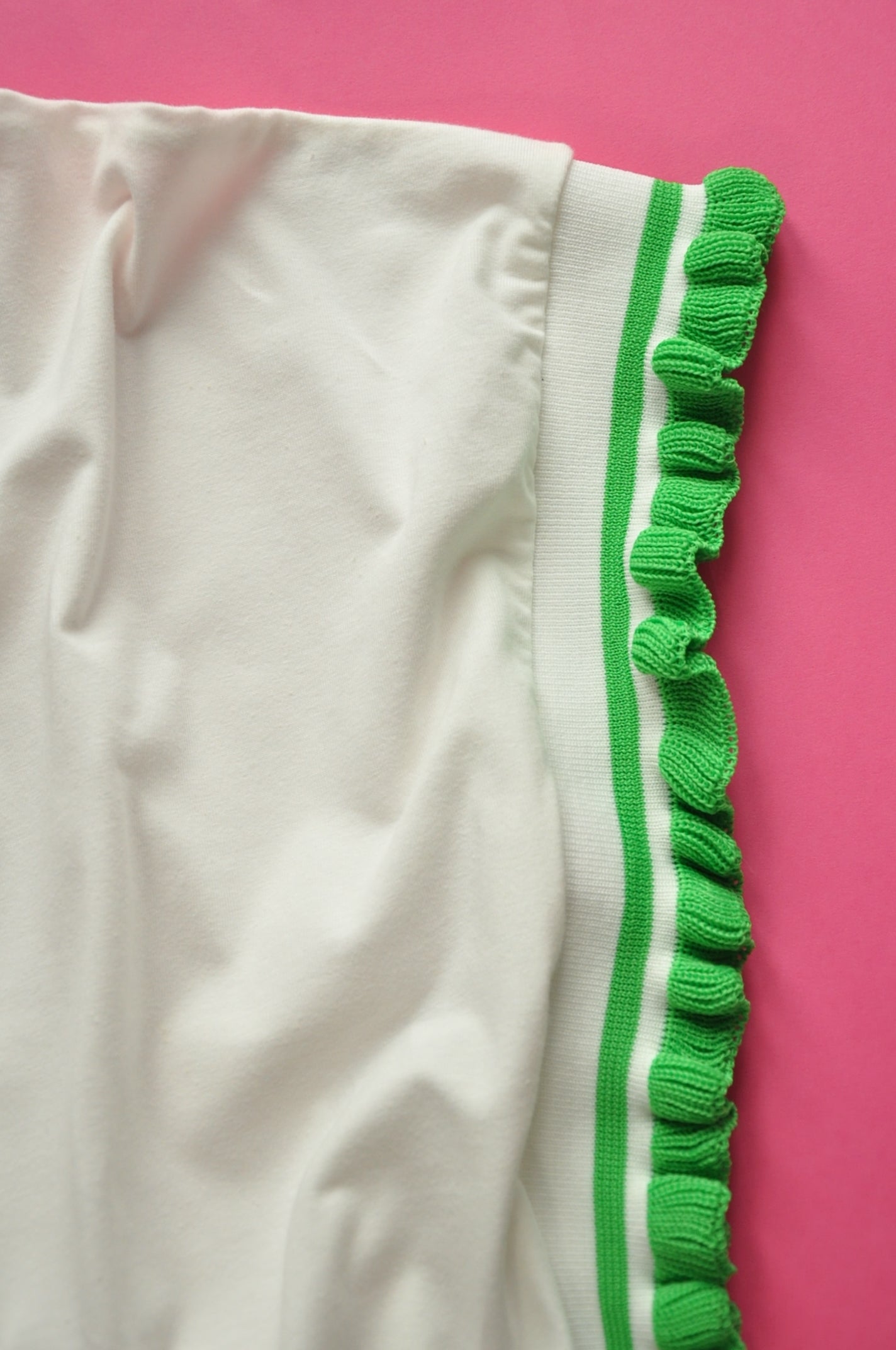 Cream soft cotton tee with extreme knit frill green sleeves