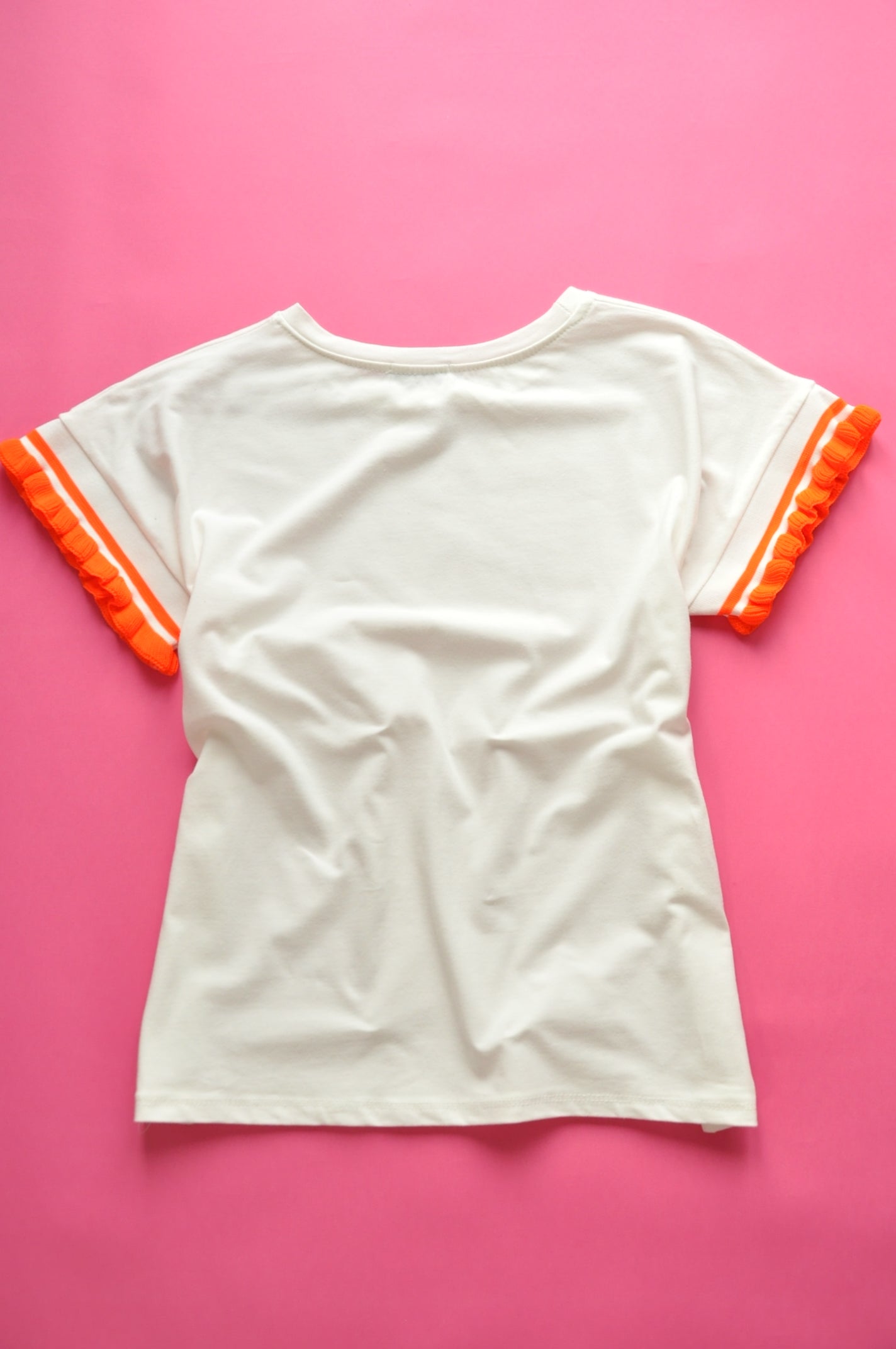 Cream soft cotton tee with neon orange knit frill sleeves