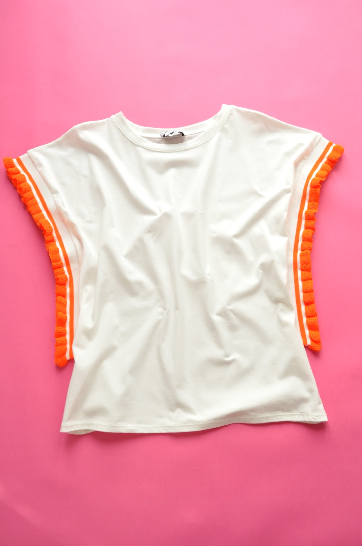 Cream soft cotton tee with extreme knit frill orange sleeves