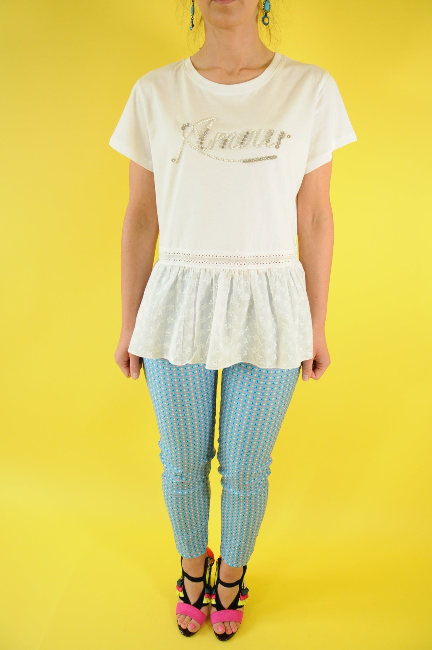 White peplum t-shirt with gleaming silver accent