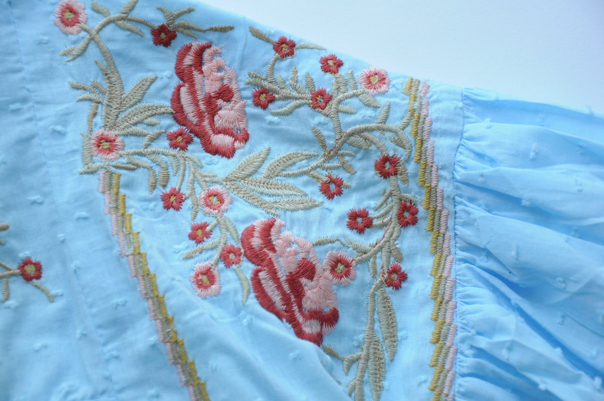 Baby blue embroidered blouse