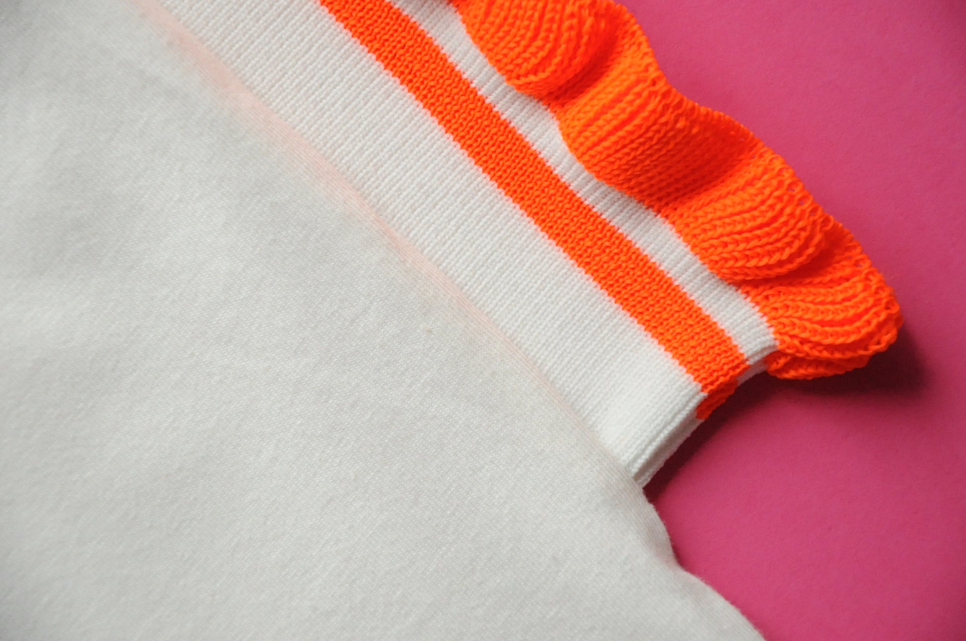 Cream soft cotton tee with extreme knit frill orange sleeves