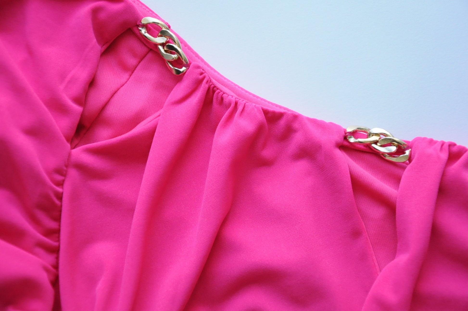 Chain embellished pink asymmetric top