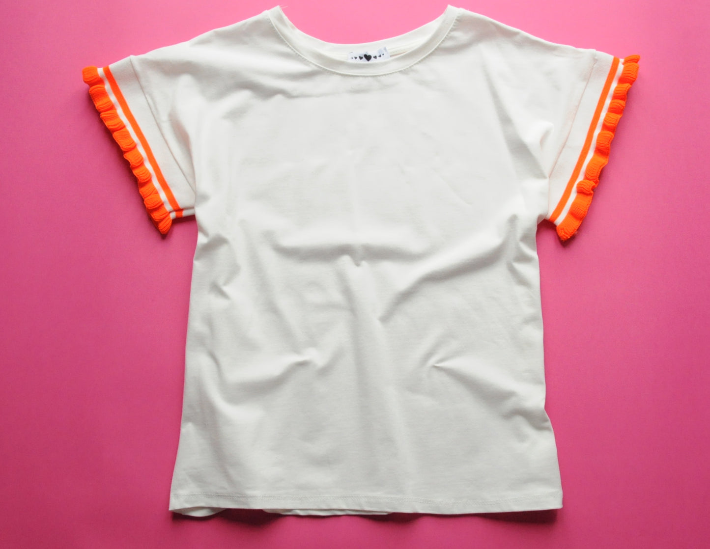 Cream soft cotton tee with neon orange knit frill sleeves