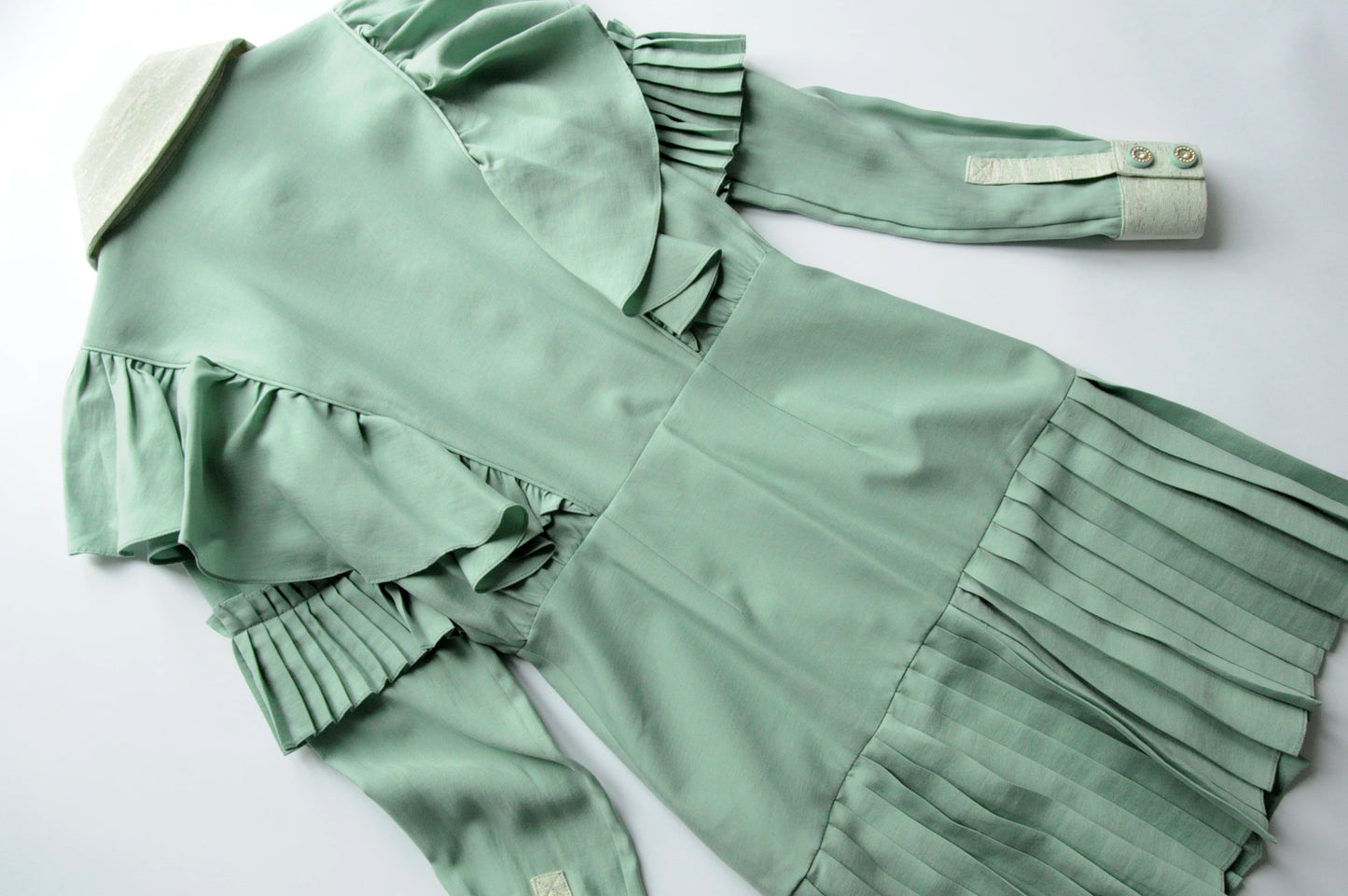 Pale teal button-embellished pleated shirt dress